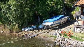 Boat lifted on an aluminium dock